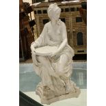 Continental parian sculpture circa 1860, depicting a partially nude female wearing a flowing gown