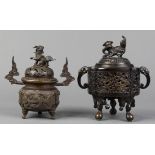 (lot of 2) Japanese bronze censers: one with open work body on tripod, zoomorphic handles and