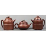 (lot of 3) Chinese zisha ceramic teapots, one pair of cylindrical form and the other with a