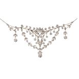 Edwardian diamond, platinum-topped 14k yellow gold bib necklace Featuring (1) old European-cut