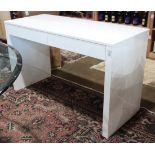 Modern white laquered work station, having two drawers centering the slab legs, 29"h x 48"w x 20"