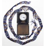 Travel clock and beads Including 1) Junghans metal and leather (falling apart) folding clock,