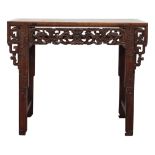 Chinese wooden altar table, the apron pierced with dragons and a bat, the support accented with bats