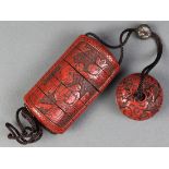 Japanese four-case inro, cinnabar lacquer with scholars and a matching manju netsuke with a dragon