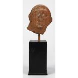 Eypto-Roman style terracotta mask of a tradedian, made of sun baked clay and polychromed, the