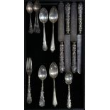 (lot of 21) Associated sterling flatware group, consisting of (4) knives with silver plate