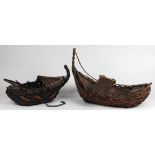 (lot of 2) Japanese bamboo okimono/ikebana baskets, both boat shaped, one of the with iron chain for