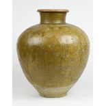 Southeast Asian glazed ceramic storage jar, 15th century, with a rolled rim and cylindrical neck