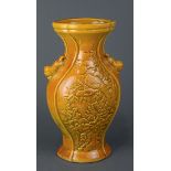 Chinese yellow glazed porcelain vase, body molded with birds-and-flowers below the fu-lion