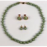 Jadeite bead and 14k yellow gold jewelry Including 1) 8.0 mm, jadeite bead, 14k yellow gold 15