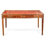 English George III mahogany partner's desk, circa 1790-1810, having an embossed leather top, above