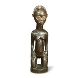 (lot of 3) Ethnographic carved figural groups, consisting of a West African style kneeling figure