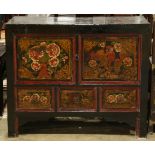 Chinese lacquered coffer, the hinged double doors painted with peonies and a figure mounted on a