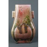 Chinese peach bloom glazed porcelain arrow vase, of flattened hu form, the body molded with peach