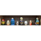 (lot of 8) Russian lacquered nesting dolls in various sizes, largest: 7"h