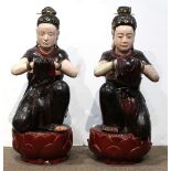 Pair of Vietnamese polychrome lacquered wooden apsaras, in a genuflection position with cloth draped