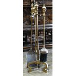 Brass fireplace tool set, consisting of a poker, broom, and shovel, 30"h