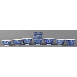 (lot of 12) Chinese underglazed blue porcelain cups, similarly decorated with a pair of meandering
