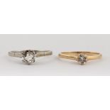 (Lot of 2) Diamond and gold rings Including 1) ring, featuring (1) 0.50 ct., full-cut diamond, set