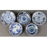 (lot of 5) Chinese underglaze blue porcelain dishes: including three floral; one with a phoenix to