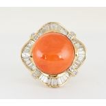 Coral, diamond and 14k yellow gold ring Centering (1) coral button cabochon, measuring approximately