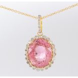 Tourmaline, diamond and 18k yellow gold pendant-necklace Centering (1) oval-cut tourmaline, weighing