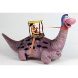 Flintstones Dino the dinosaur toy, depicting Fred Flintstone riding Dino, 11.5"h