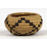 Native American Pomo miniature basket, having a monochome decorated body, 1/2"h x 1"w