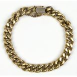 14k yellow gold bracelet The 14k yellow gold, hollow curb link, measures approximately 8.5 mm,