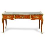 Louis XV kingwood and ormolu mounted bureau plat, having a gilt embossed writing surface surmounting