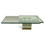 Lion in Frost acrylic and glass coffee table, having overlapping plate glass tops, conjoined with