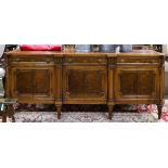 Neoclassical style sideboard by Karges, having a gallery top above the three drawer case having