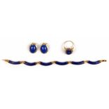 Lapis lazuli and 14k yellow gold jewelry suite Including 1) lapis lazuli and 14k yellow gold ring,
