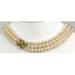Cultured pearl, multi-stone and 14k yellow gold triple strand necklace Composed of (136)