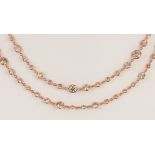 Diamond and 18k rose gold necklace Composed of (186) full-cut diamonds, weighing a total of