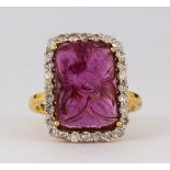 Tourmaline, diamond and 18k yellow gold ring Centering (1) rectangular tourmaline cabochon,