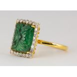 Carved emerald, diamond and 18k yellow gold ring Centering (1) rectangular carved emerald