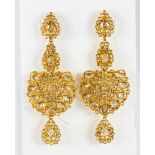 Pair of diamond, 22k and 14k yellow gold ear-pendants Featuring (184) rose-cut diamonds, set in an