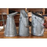 (lot of 3) French tin watering cans, largest 20"h; Provenance: Cafe Society, SF & Napa