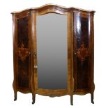 Louis XV style French Provence triple burl inlaid armoire, having a shaped crest, above three doors,