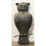 Mid Century owl form wall hanging, executed in metal, and depicted perched on a branch, 46.5"h