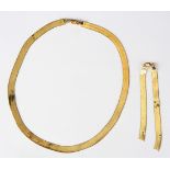 10k yellow gold cobra link suite Including 1) 7.0 mm, 10k yellow gold, cobra link, completed by a