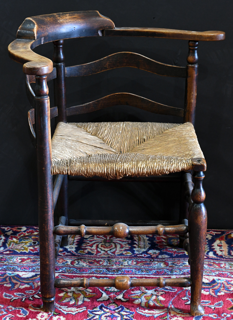 Connecticut Queen Anne corner chair circa 1750, with remnants of original black paint, with rush