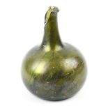 Egypto-Roman iridescent blown glass wine flask, executed in olive green, having a stick neck above a