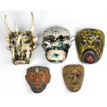 (lot of 5) Mexican polychrome decorated masks, one depicting Diablo, another a stylized face, and