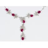 Treated rubies, diamonds and 14k white gold necklace Featuring (7) pear-cut fracture filled