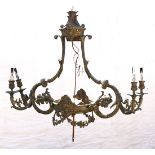 Classical style bronze chandelier, having a center pendant light, surrounding four lights each