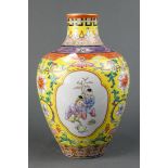 Chinese enameled porcelain vase, with a short neck and a tapering ovoid body featuring reserves of