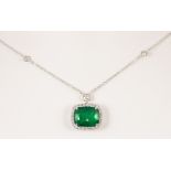 Emerald, diamond and 18k white gold pendant-necklace Centering (1) cushion-cut emerald, weighing