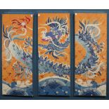 Set of three silk screens, the triptych forming a meandering blue dragon on an orange ground with